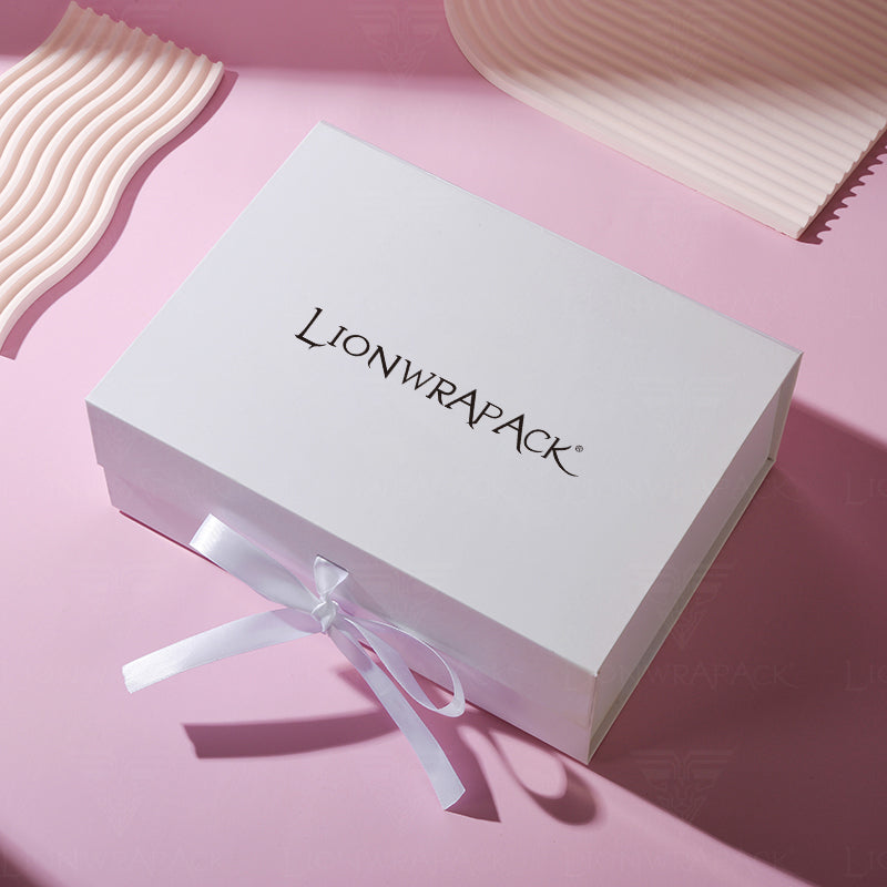 Closed white custom gift box with a branded lid and a white satin ribbon tied at the front.