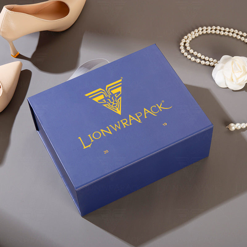 Navy blue rectangular gift box with a gold LIONWRAPACK logo