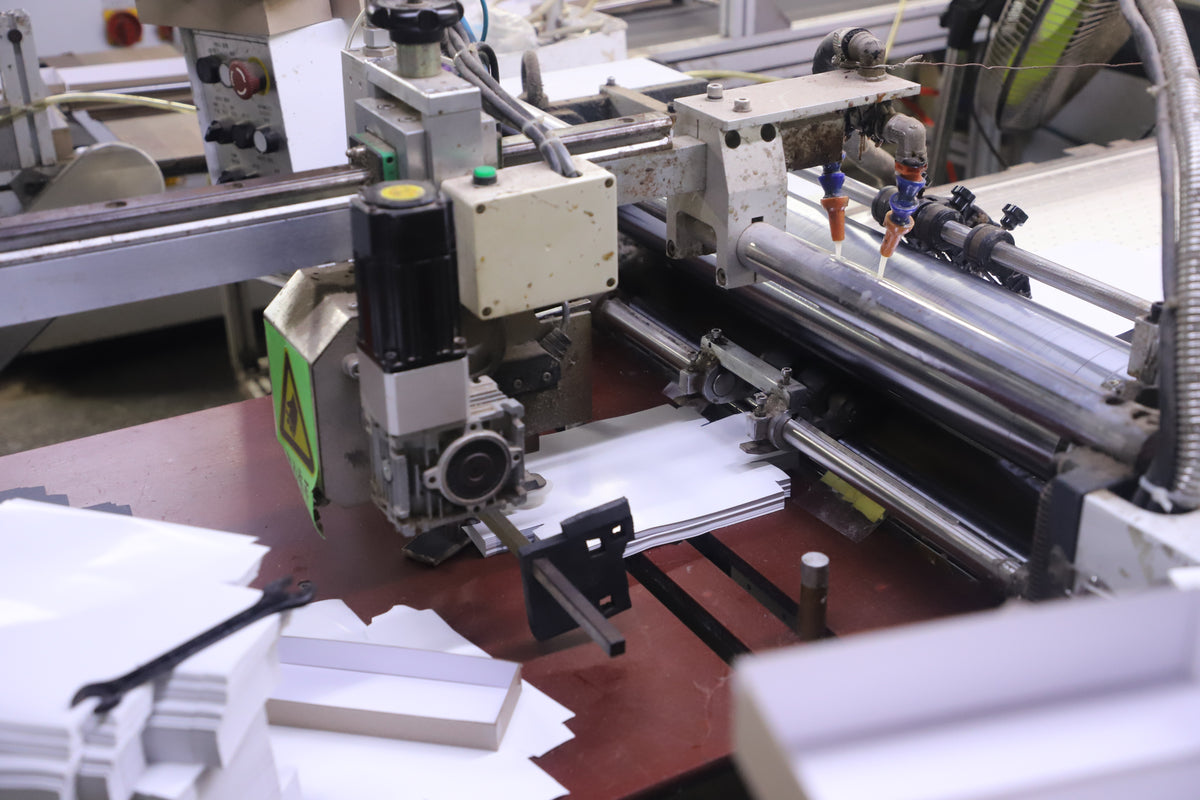 automatic paper feeding and gluing machine for custom box manufacturing