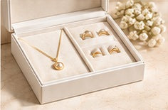Cream jewellery gift box with separate necklace and ring compartments
